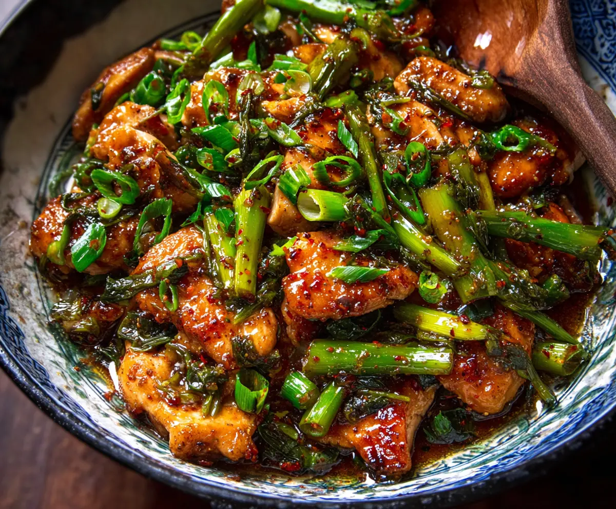 Juicy Chinese scallion chicken served with aromatic green onions and savory sauce.
