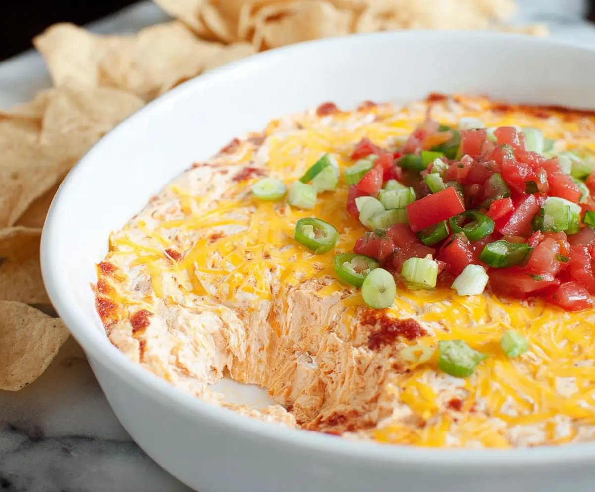 Cream Cheese Salsa Dip served with tortilla chips, perfect for parties and snacking.