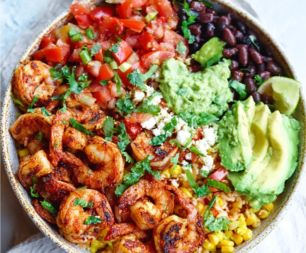 Delicious Mexican shrimp bowls with fresh vegetables and flavorful spices.